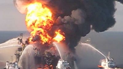 Observe fireboat responding to crews battling the fire during the Deepwater Horizon oil spill of 2010