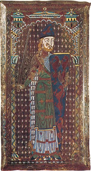 The image shows stylized plaque from the 12th century.