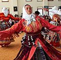 Anatolian Alevi Muslims perform Semah at a Djemevi (cem house or cemevi) to celebrate Newroz -the arrival of spring - the "Rite of Unity". They pray together in this special mass officiated by religious Alevi leader "Dede", performed dhikr and performed Semah - a religious dance, in Ismir, Turkey, March 26, 2022