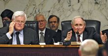 Senate Armed Services Committee Chairman Sen. Carl Levin (R) (D-MI) asks Sec. of Defense Robert M. Gates a question as Sen. Edward Kennedy (D-MA) looks on during a hearing in WA, D.C. concerning the future of Iraq, April 10, 2008. Ted Kennedy