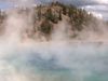 The video thumbnail image shows mist rising from a body of water in front of a hill.