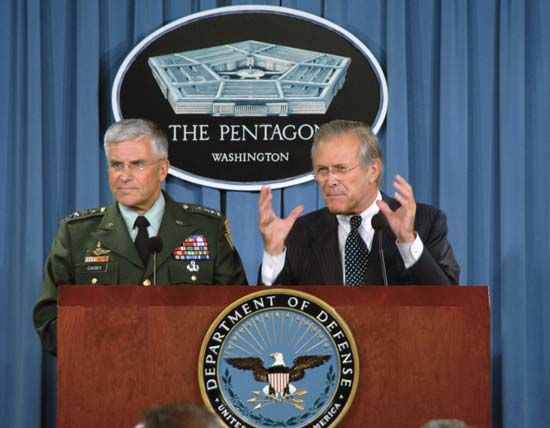 Donald Rumsfeld and George W. Casey, Jr.